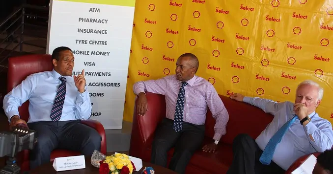 Vivo Energy Uganda MD Hans Paulsen (Left) chats with the group CEO Christian Chammas (right ) and the Executive Vice president supply and marketing David Mureithi after opening Java House at Shell Amber court in Jinja.