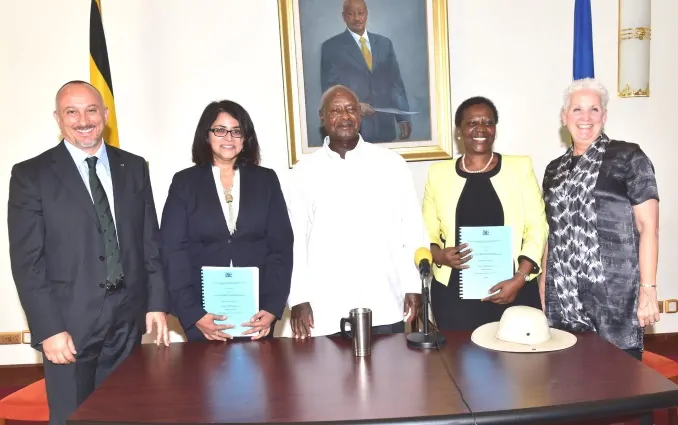 Officials and Uganda's president after the signing of a contract with the Albertine Graben Refinery Consortium to finance and construct Uganda’s first oil refinery