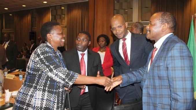 Uganda's energy minister, Irene Muloni, Medard Kalemani, the minister of energy, Tanzania, with other delegates from Tanzania after a meeting in Kampala
