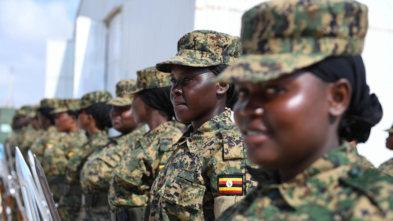 Amisom female peacekeepers from Uganda mounting an honour guard in Somalia