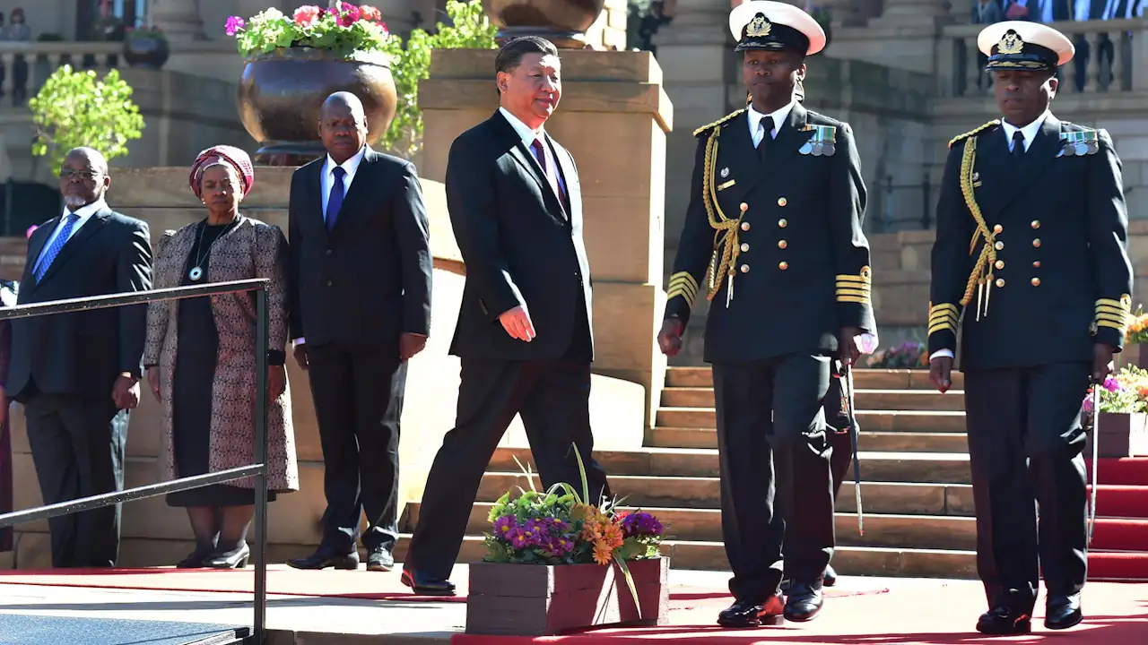 Chinese President Xi Jinping inspects a guard of honour during a state visit to South Africa in July 2024.