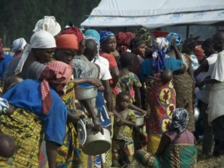 Congolese refugees queuing up for aid in Bundibugyo district, Uganda