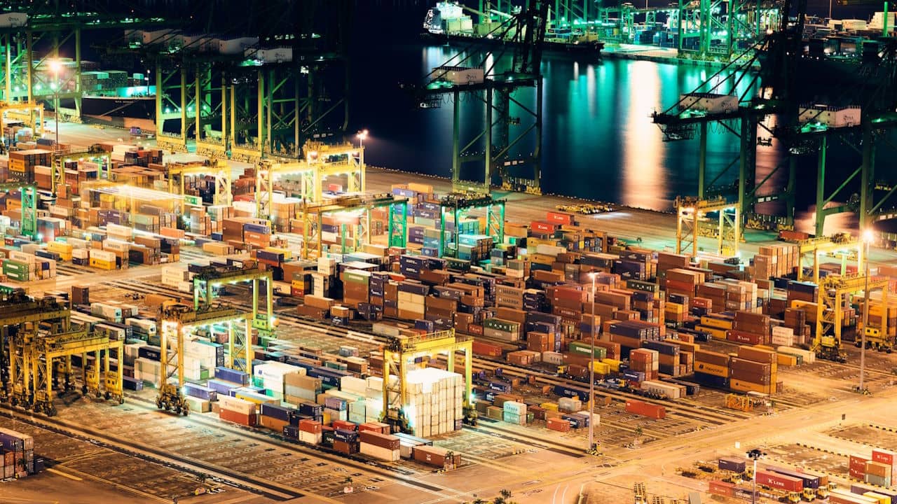 Overhead image of shipping containers in a port
