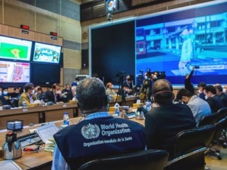 Government officials holding a meeting in a boardroom