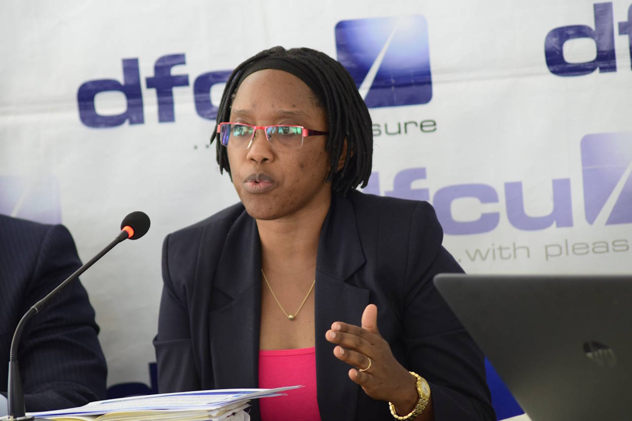A female bank executive speaks at a press conference
