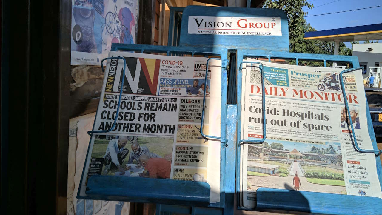 Copies of Uganda's leading English-language dailies, the New Vision and the Daily Monitor, on a newsstand in June 2020