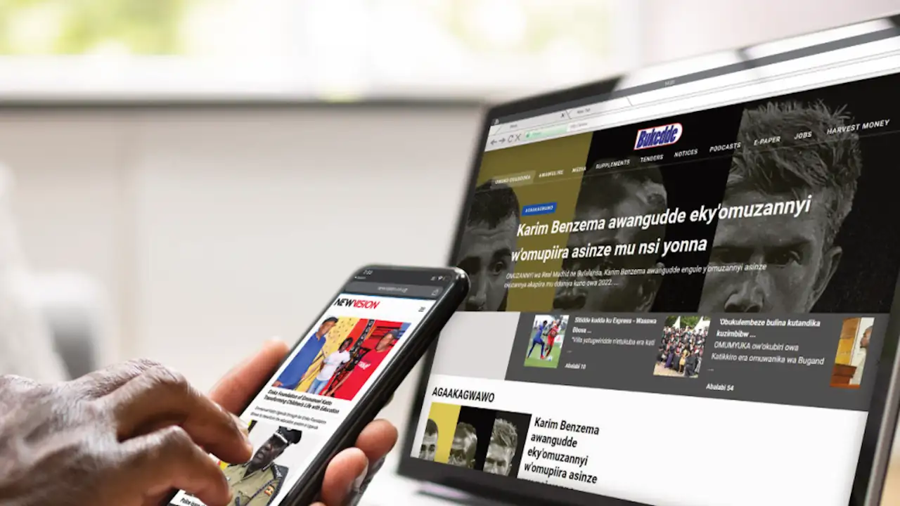 The New Vision and Bukedde websites being viewed on a mobile phone and a tablet