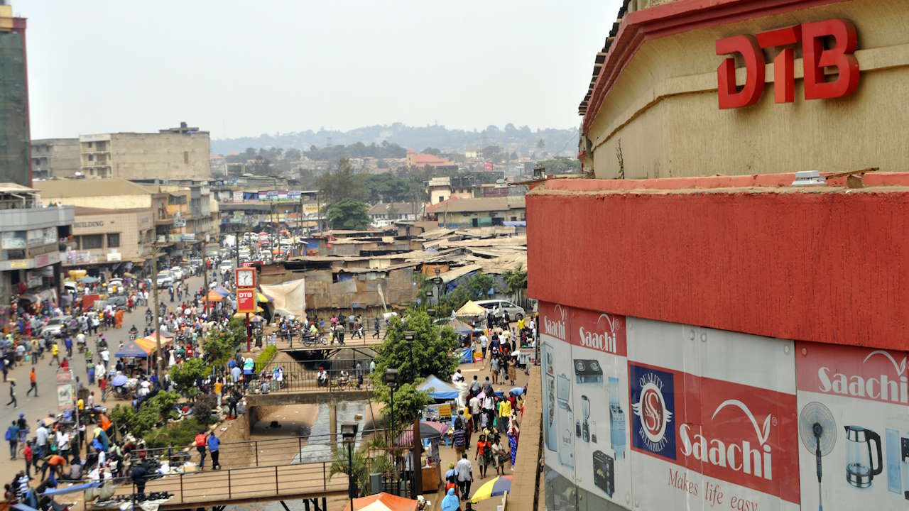 Overhead image of the downtown part of Kampala, with the logo of Diamond Trust Bank Uganda prominent and in the photographer's focus